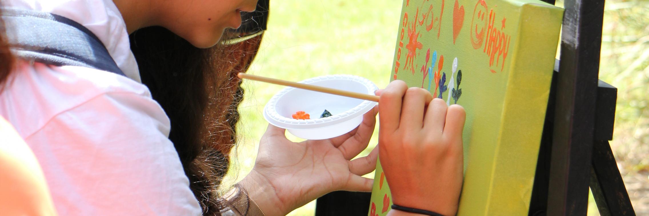 Girl Painting at Harmony Day