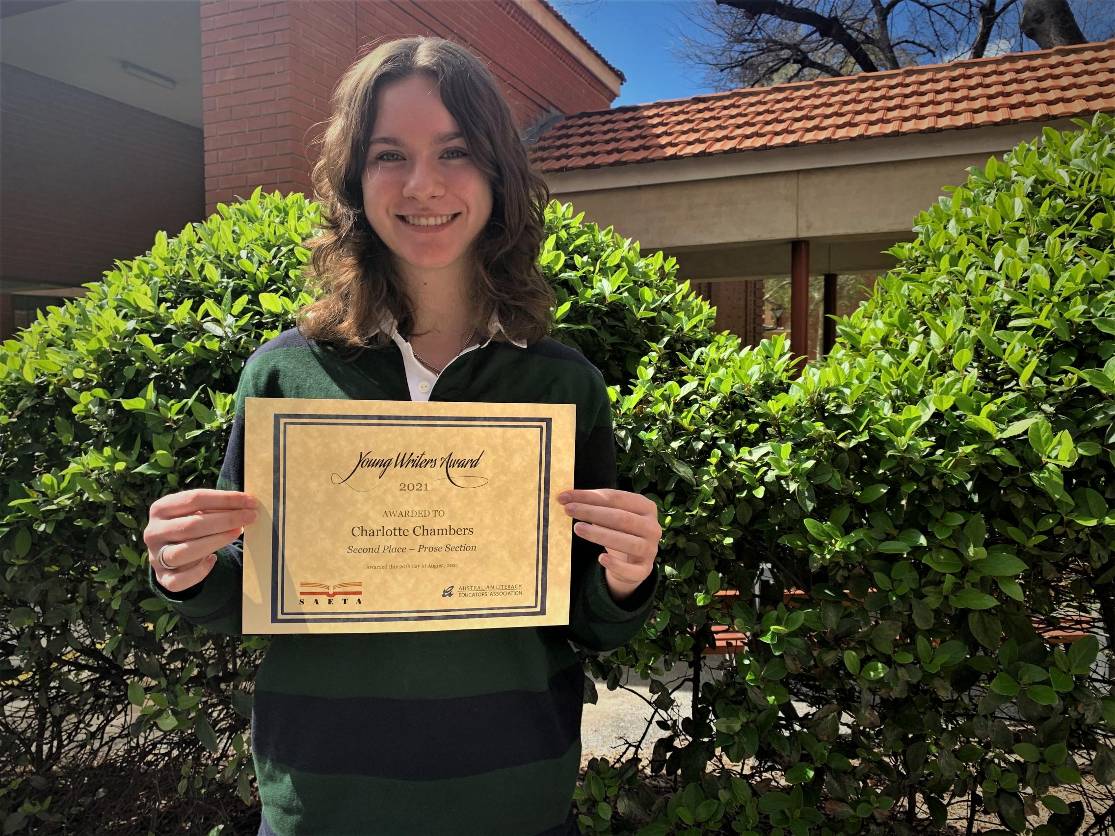 USC student Charlotte Chambers with her award